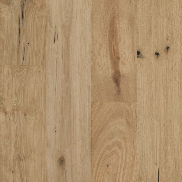A close up of a wooden floor with a grain and texture.