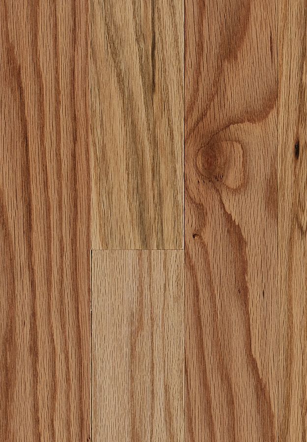 A close up of a wooden floor with a grain and texture.