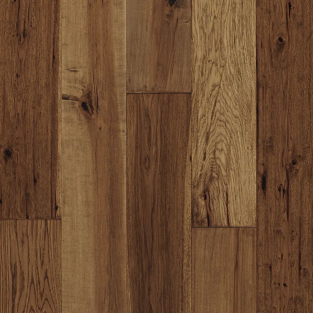 A close up of a wooden floor with a grain and texture.