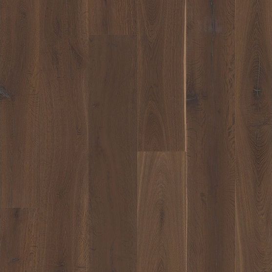 A close up of a dark brown wooden floor.