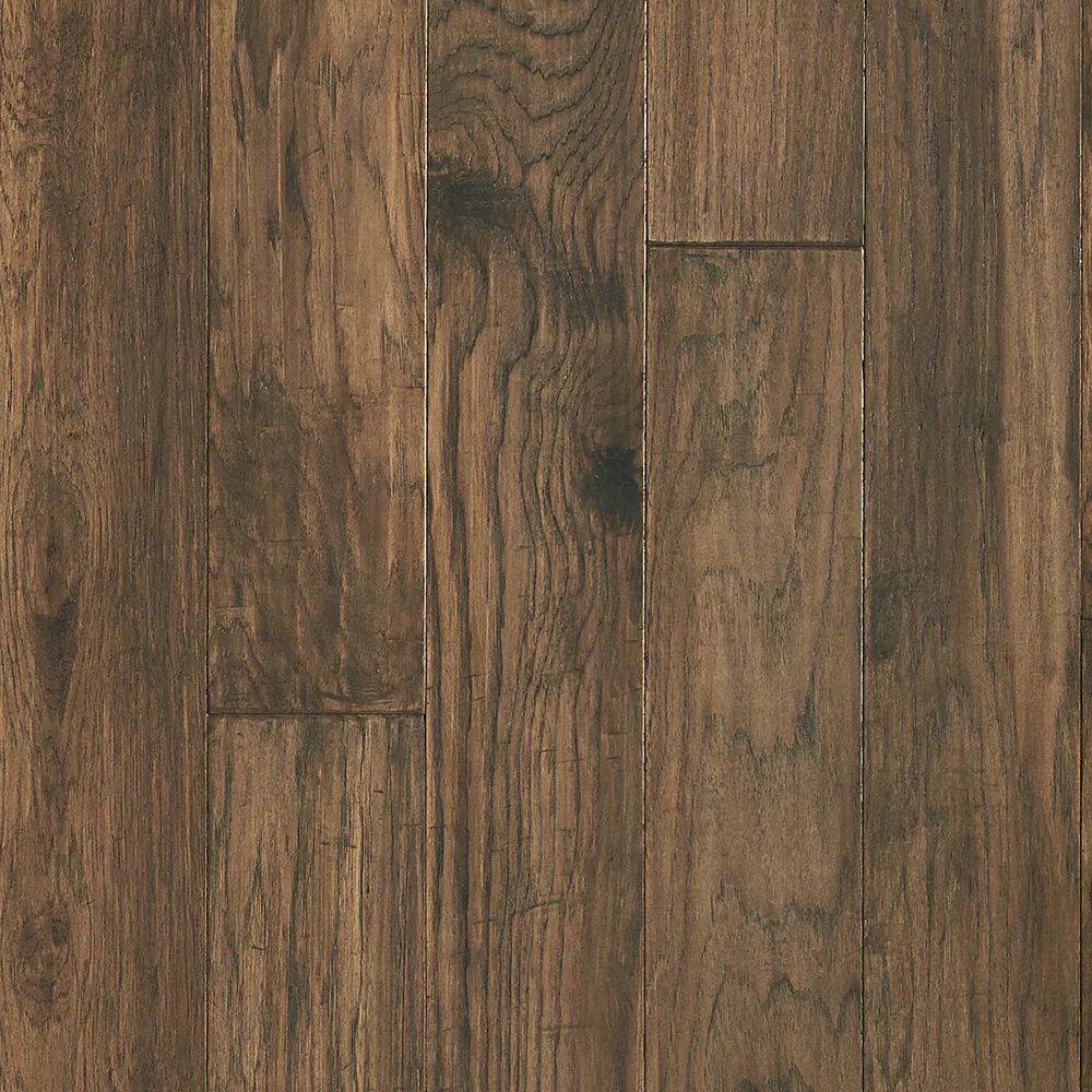 A close up of a wooden floor with a grain and texture.