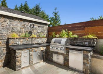 Outdoor kitchen in dark stone Outdoor kitchen and counter top in dark stone installed in Carson City NV