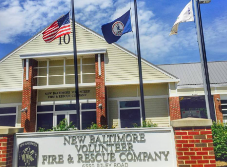 New Baltimore Volunteer Fire & Rescue Company building with flags flying above the entrance New Baltimore Volunteer Fire & Rescue Company building with flags flying above the entrance