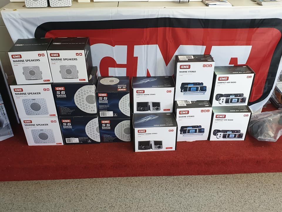 Boxes of GMI Brand Speakers and Audio Equipment Displayed on a Red Surface — Tolga Traders in Tolga, QLD