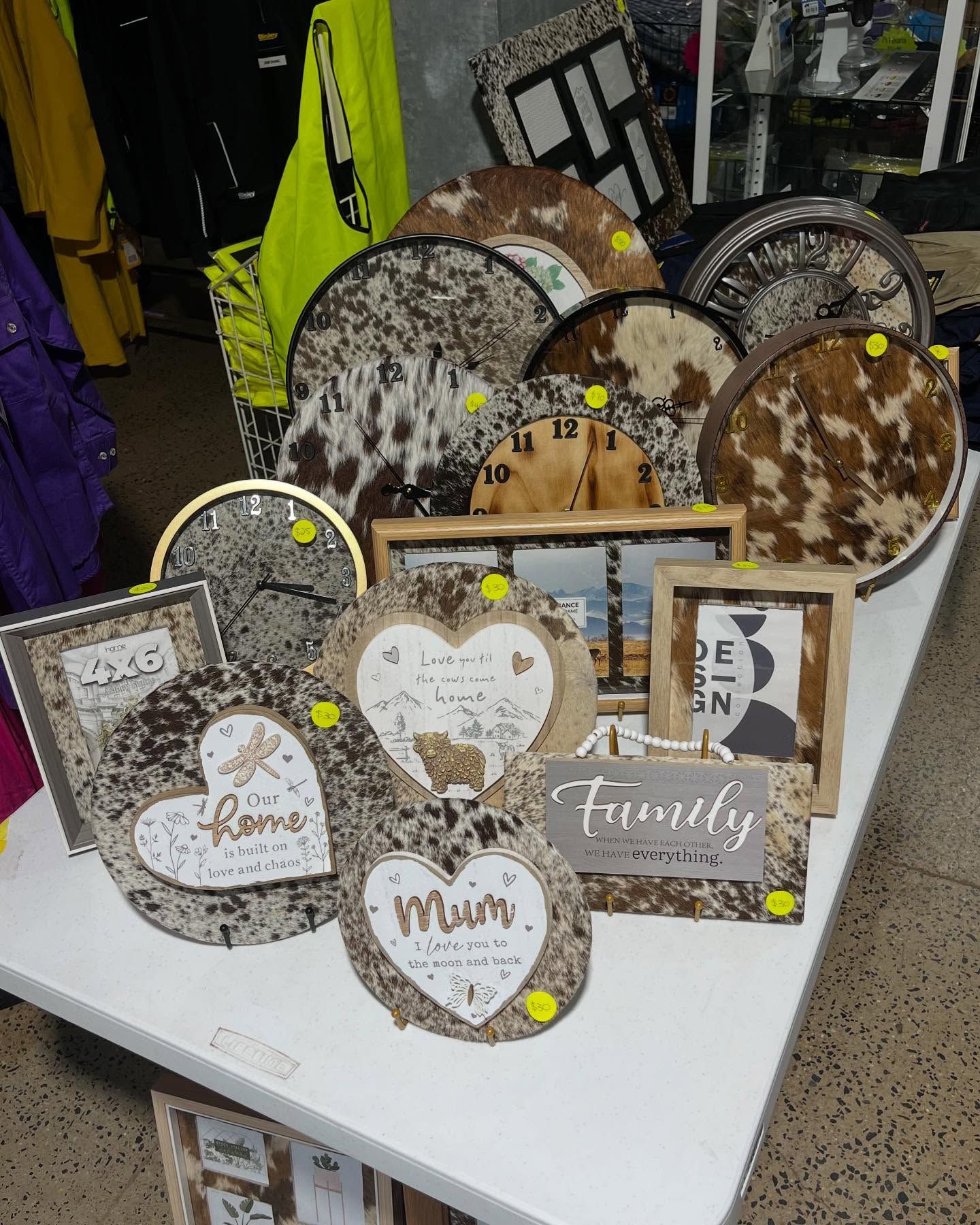 Display of Cowhide-patterned Clocks, Trays — Tolga Traders in Tolga, QLD