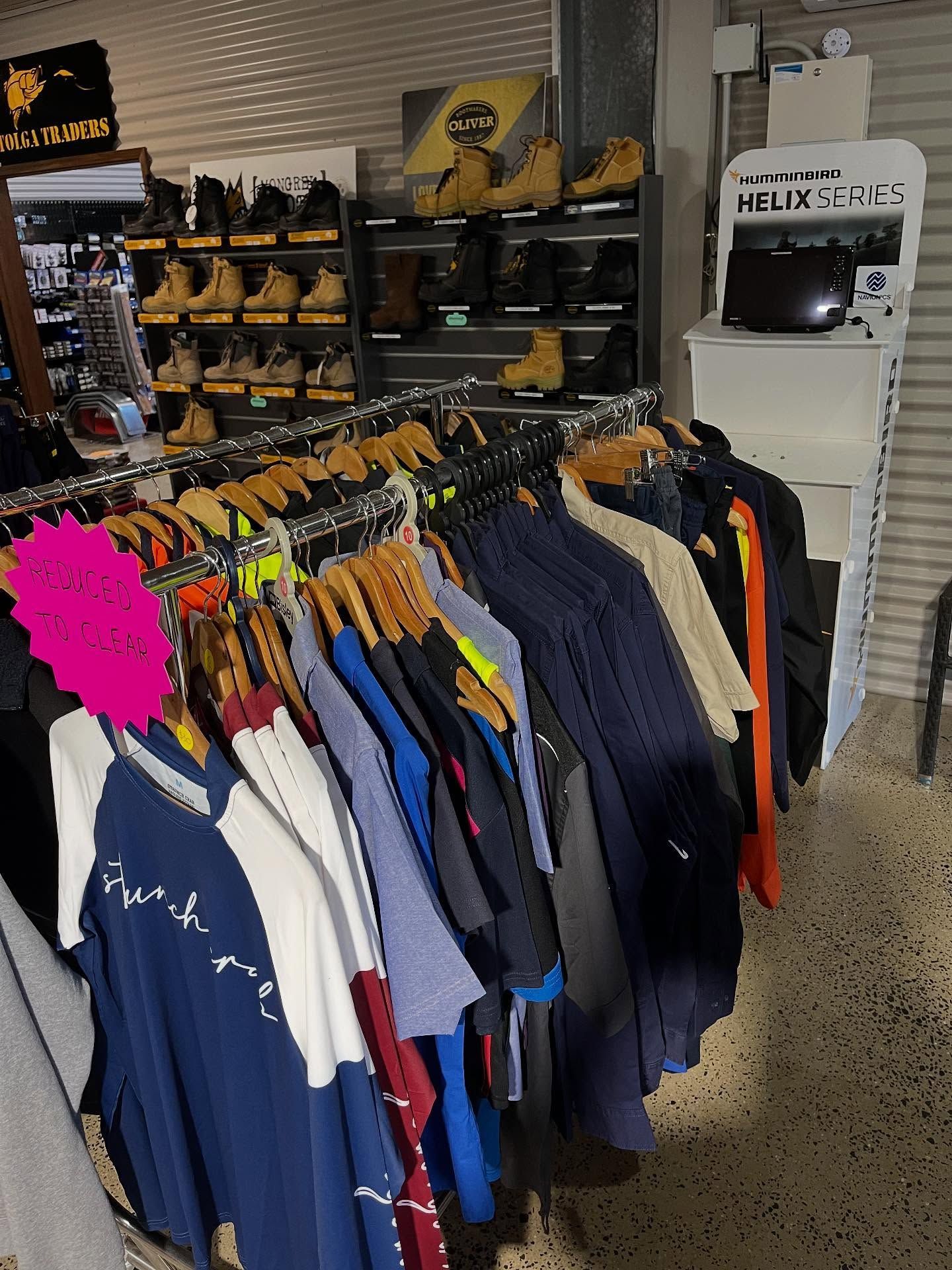 Clothes Racks With Various Garments in a Store — Tolga Traders in Tolga, QLD