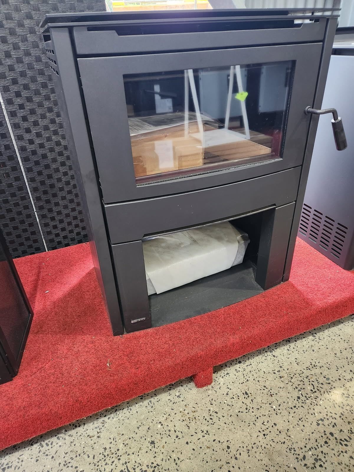 Black Wood-burning Stove With a Glass Door — Tolga Traders in Tolga, QLD