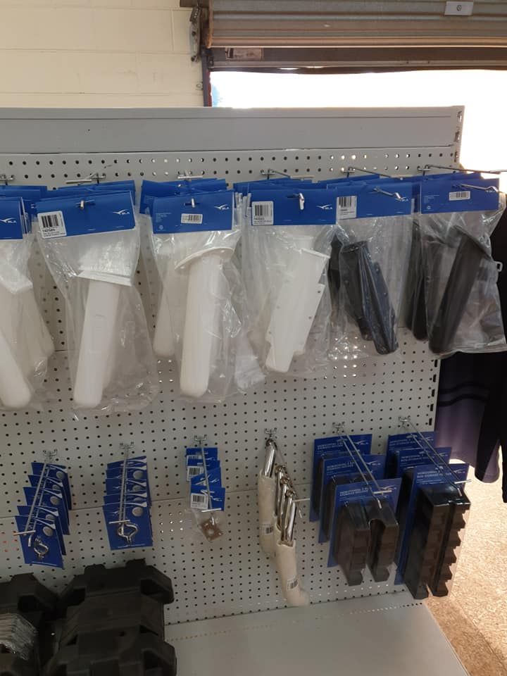 Items for Sale Hanging on a Pegboard in a Store — Tolga Traders in Tolga, QLD