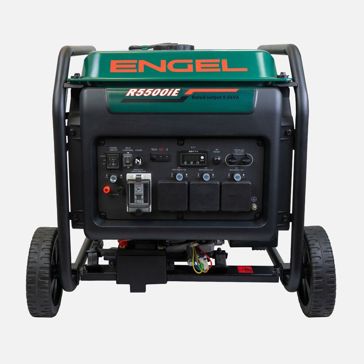 A Blue Generator i — Tolga Traders in Tolga, QLD A Blue Generator is Sitting in the Grass Next to a Tree — Tolga Traders in Tolga, QLD