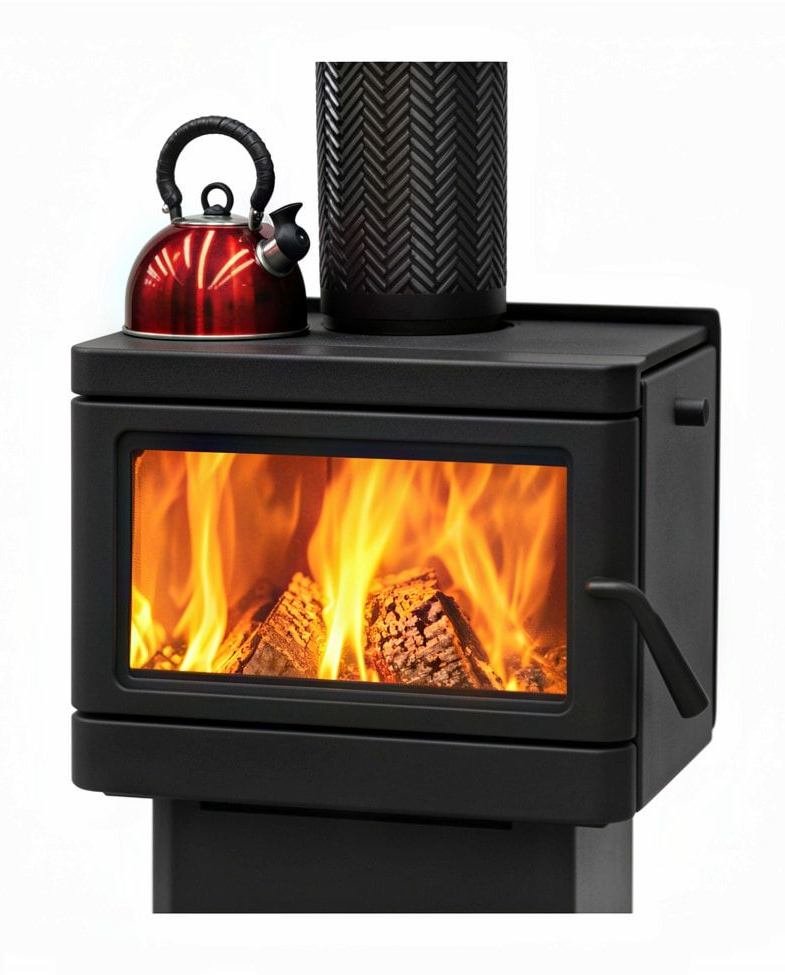Black Wood Stove With a Bright Fire, a Red Kettle on Top — Tolga Traders in Tolga, QLD