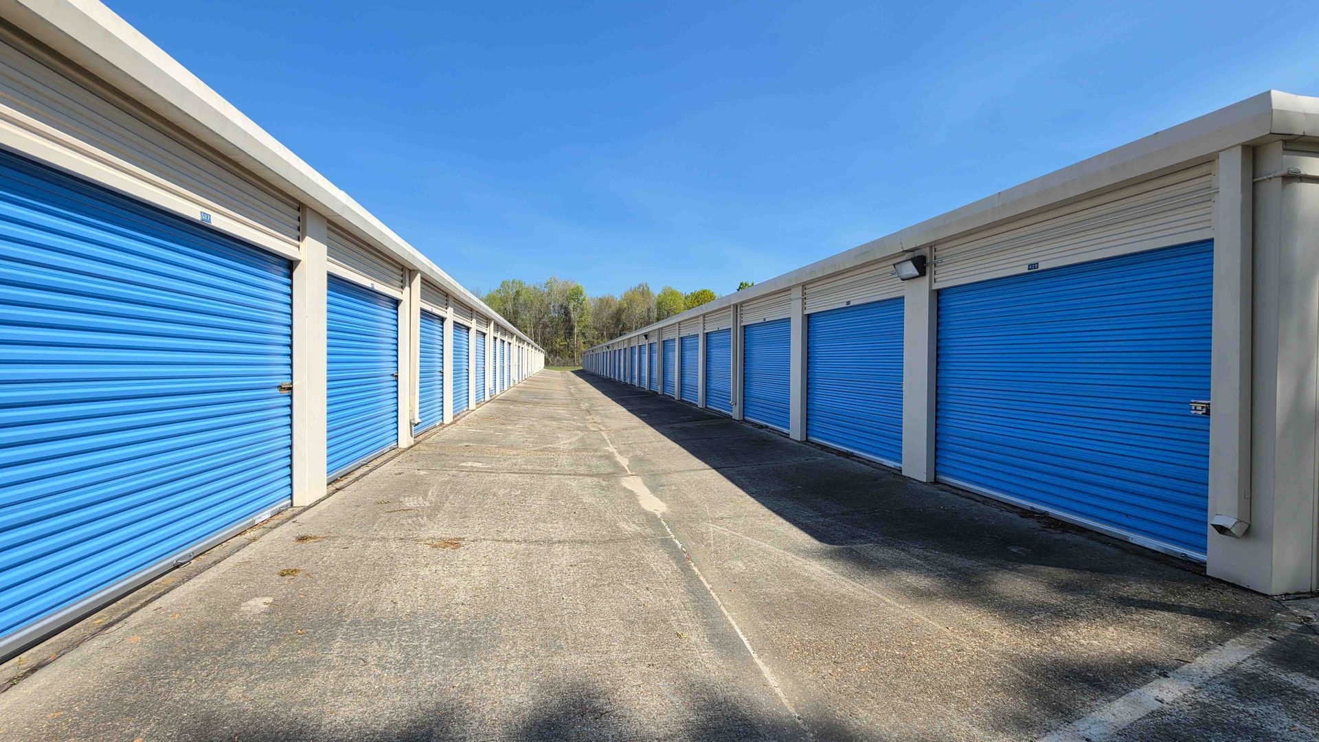 Blue drive-up storage units at Baker Boulevard Storage in Baker, LA