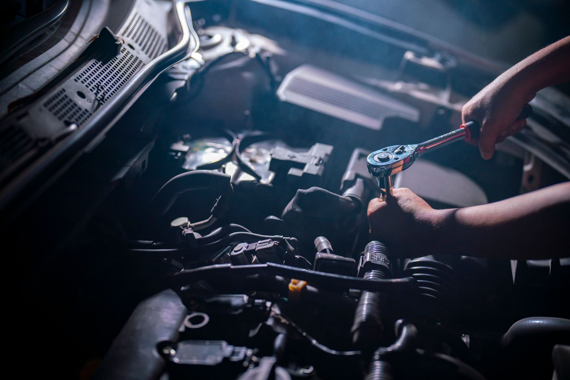 Mechanics Works On The Engine — Frisco, TX — Solutions Automotive Mechanics Works On The Engine — Frisco, TX — Solutions Automotive