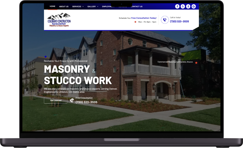 Laptop screen displaying a masonry and stucco construction company website featuring a brick building and contact info.