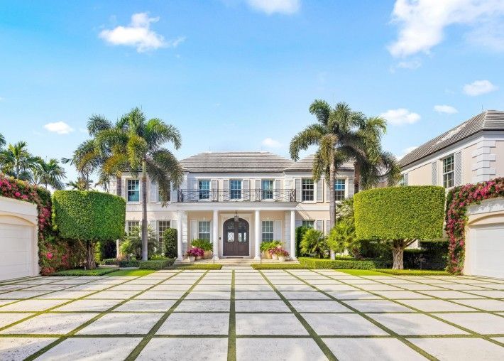 Palm Beach Driveway of Spanish Home with large modern pavers in Palm Beach, Florida
