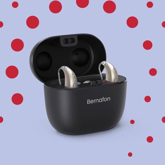 Black Bernaton Wireless Earbuds in an Open Charging Case — Local Hearing Aid Specialists in Wallsend, NSW