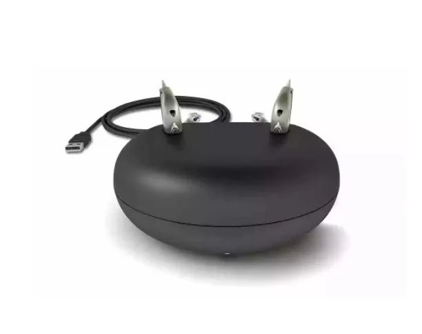 Black Oval Power Adapter With Attached Cord — Local Hearing Aid Specialists in Wallsend, NSW