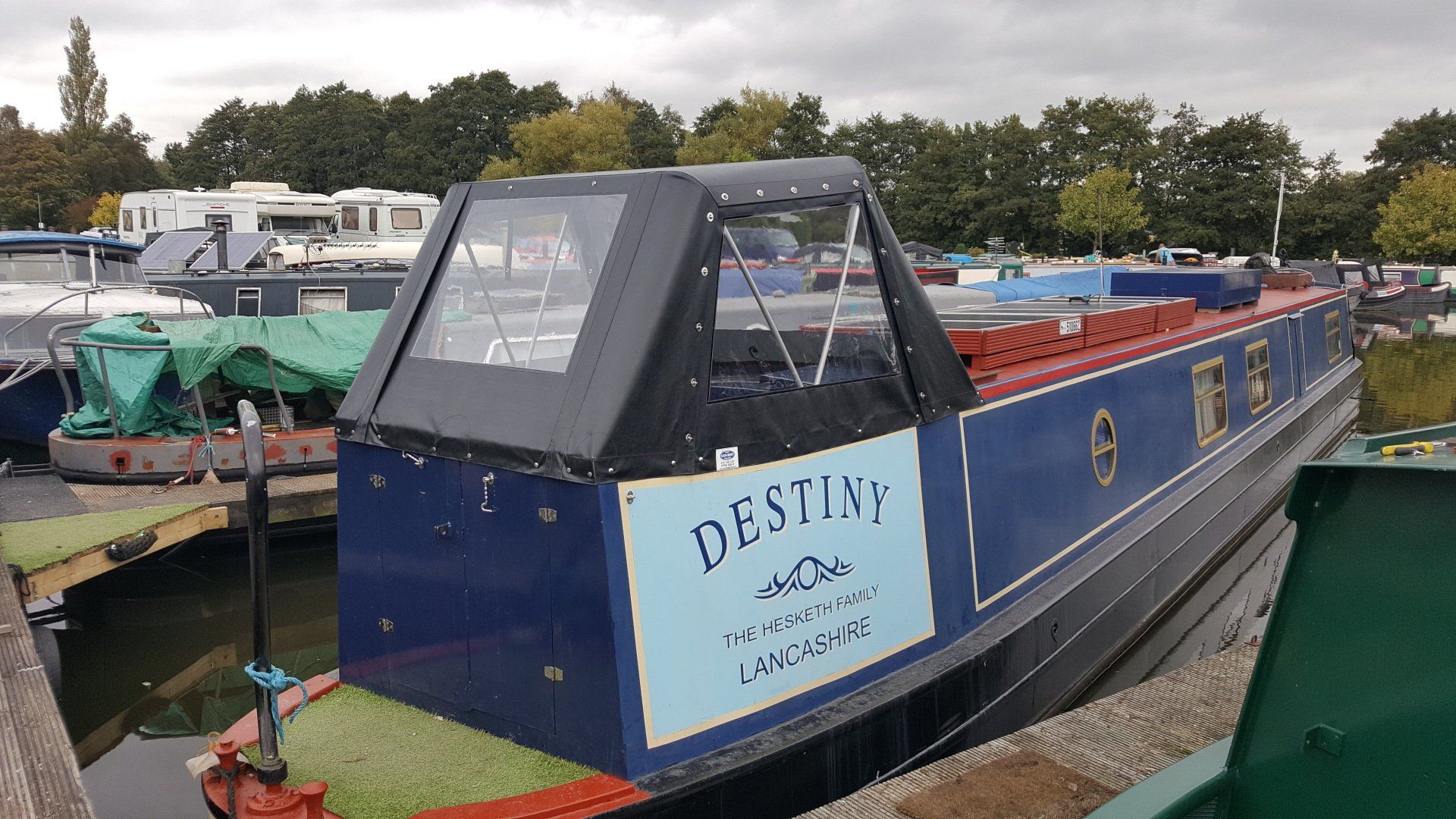 Blue boat with Pram Cover