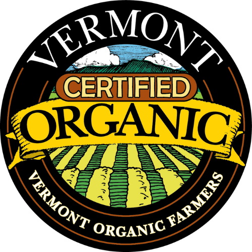 Vermont Certified Organic logo featuring a field, ribbon, and