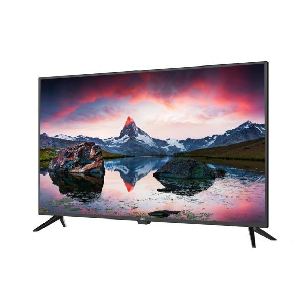 Televisor de pantalla plana que muestra un primer plano de fresas, frambuesas y moras en almíbar.