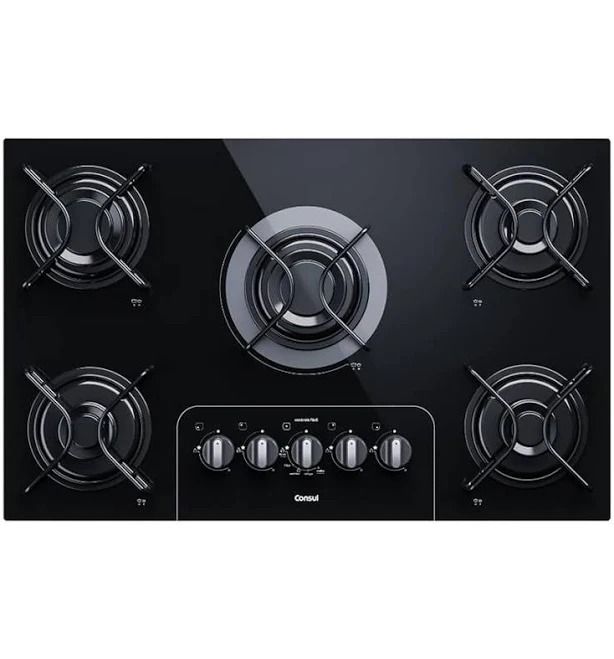 Placa de gas negra con cinco quemadores y mandos de control centrales sobre una superficie brillante.