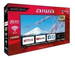 Reproductor multimedia inteligente AIWA 4K rojo con iconos de Netflix, YouTube, Facebook y Wi-Fi.