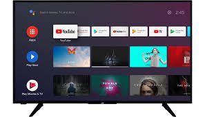 Pantalla de inicio de Smart TV con iconos de aplicaciones y miniaturas de vídeo sobre una interfaz de color morado oscuro.
