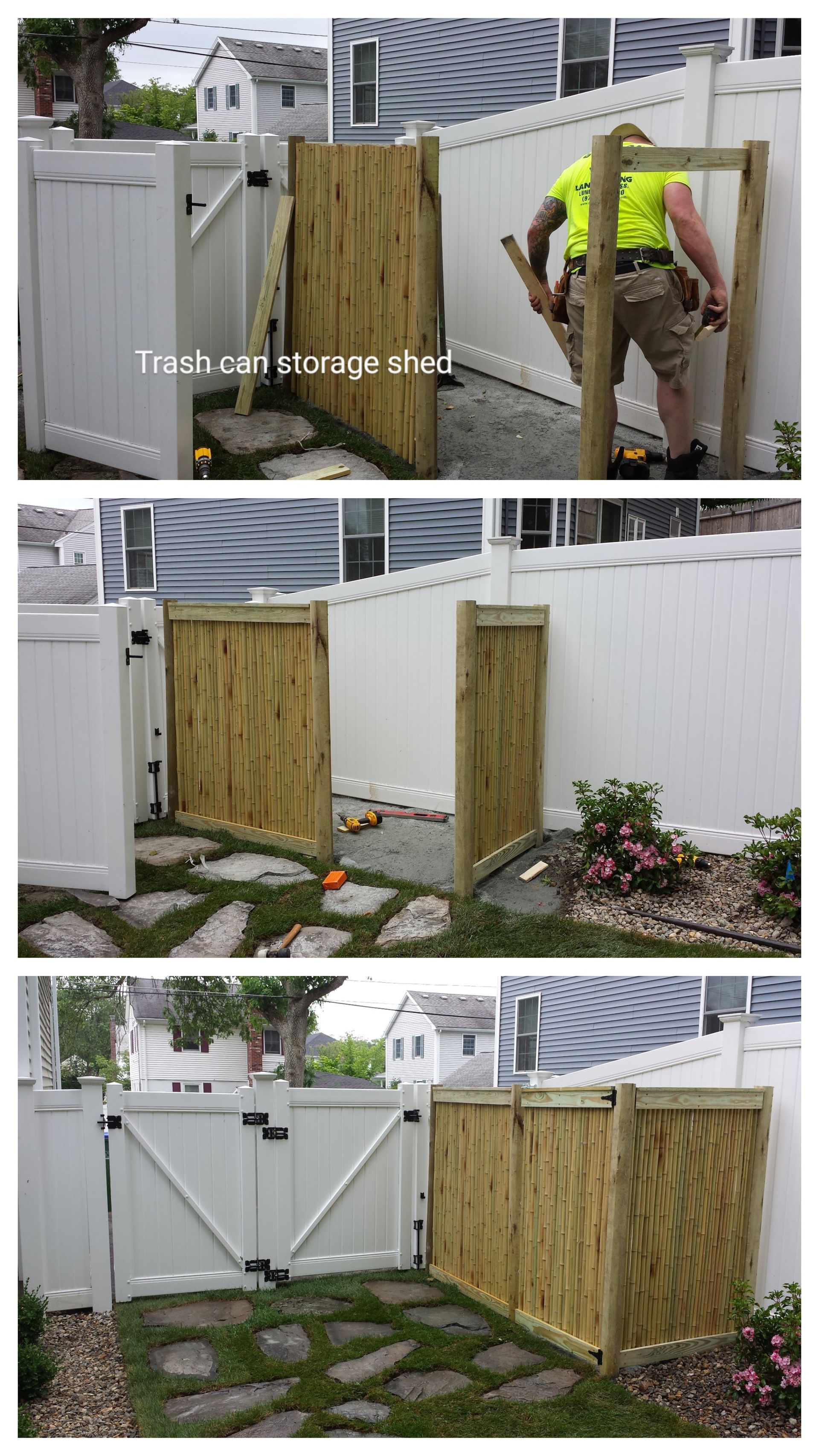 Worker installing wooden fence gates beside a white fence and garden wall.