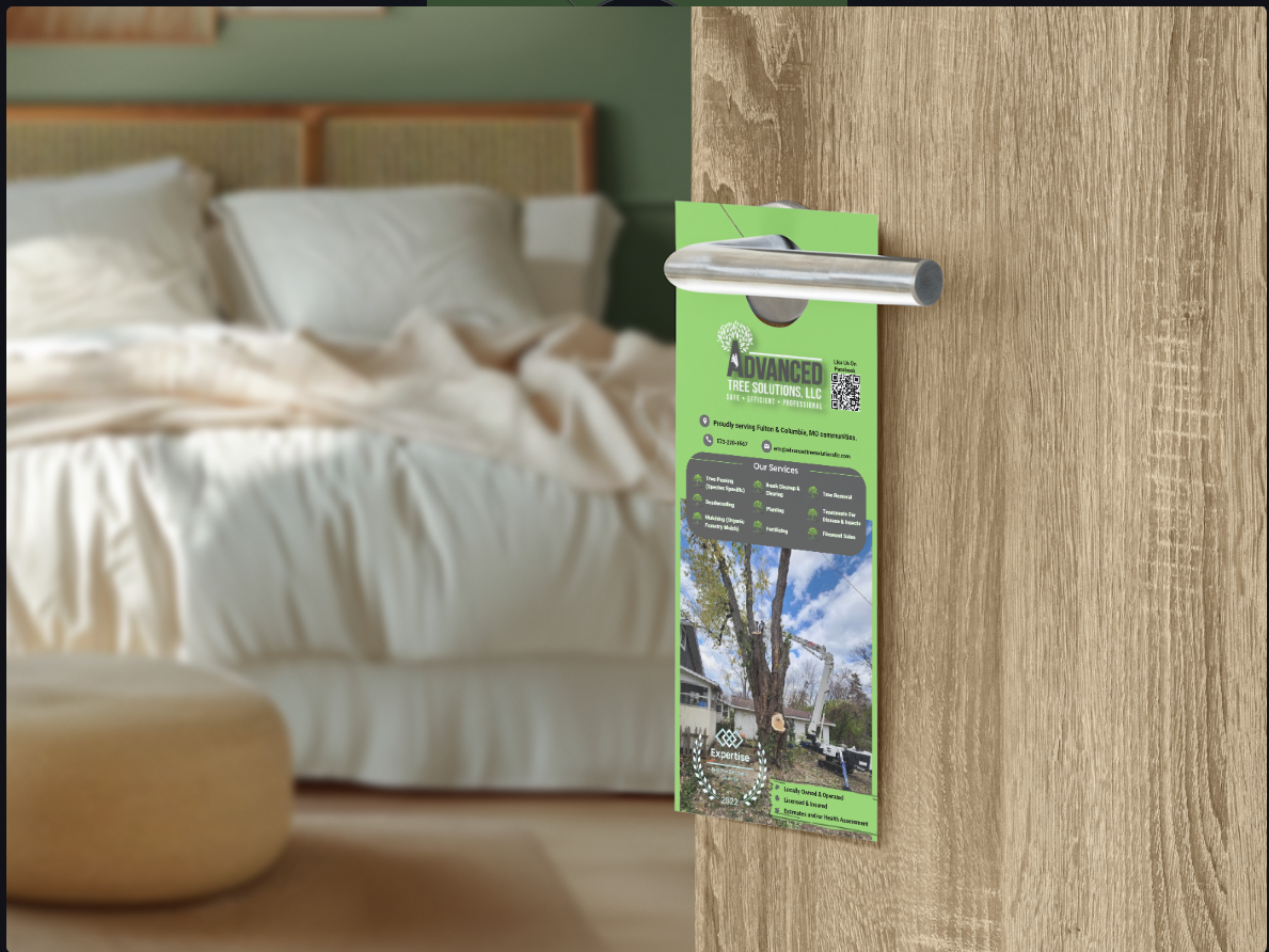 A green advertisement flyer hanging on a wooden door handle, with a blurred bedroom interior in the background.