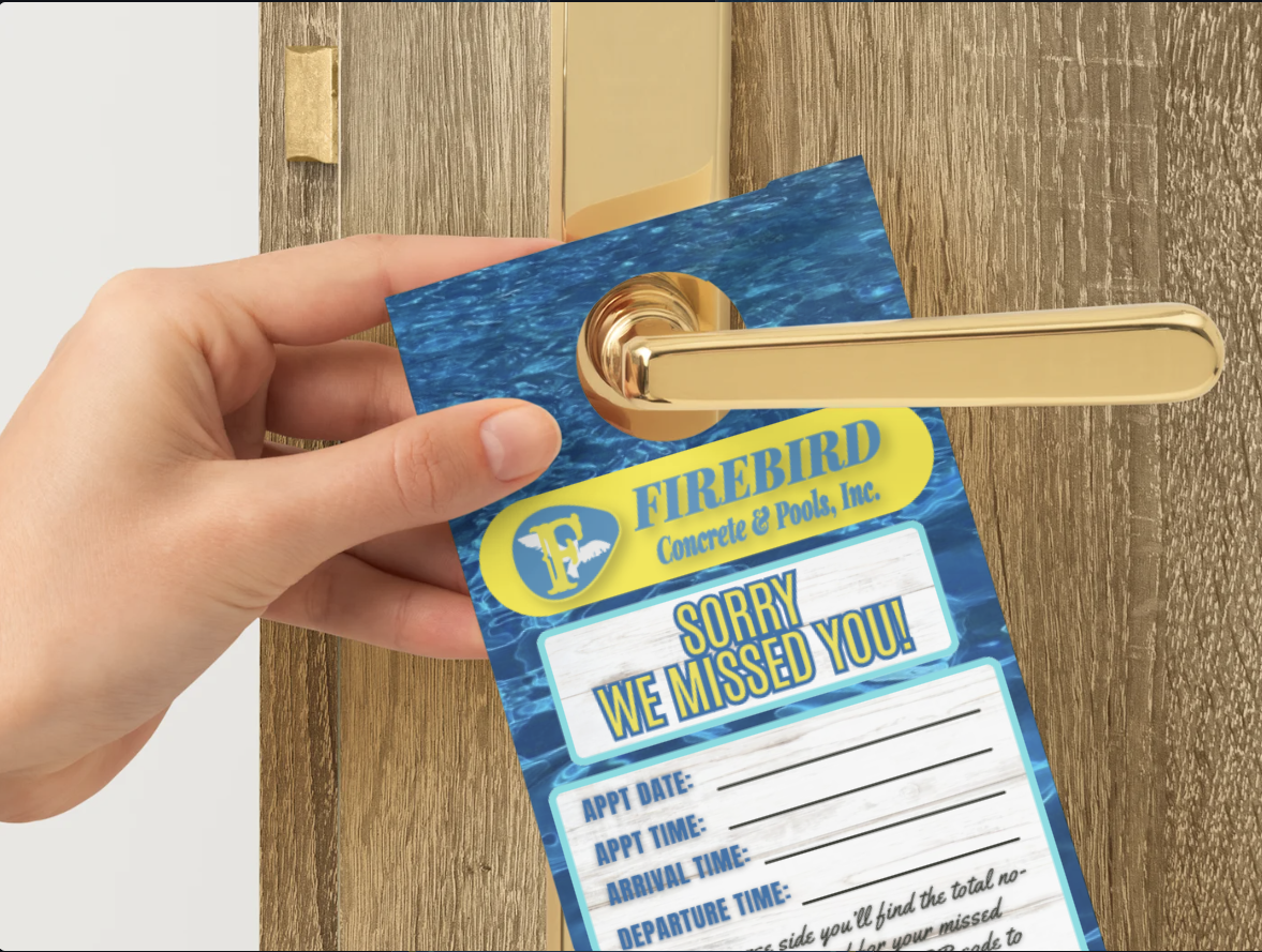 A hand hanging a blue, pool-themed door hanger that reads,
