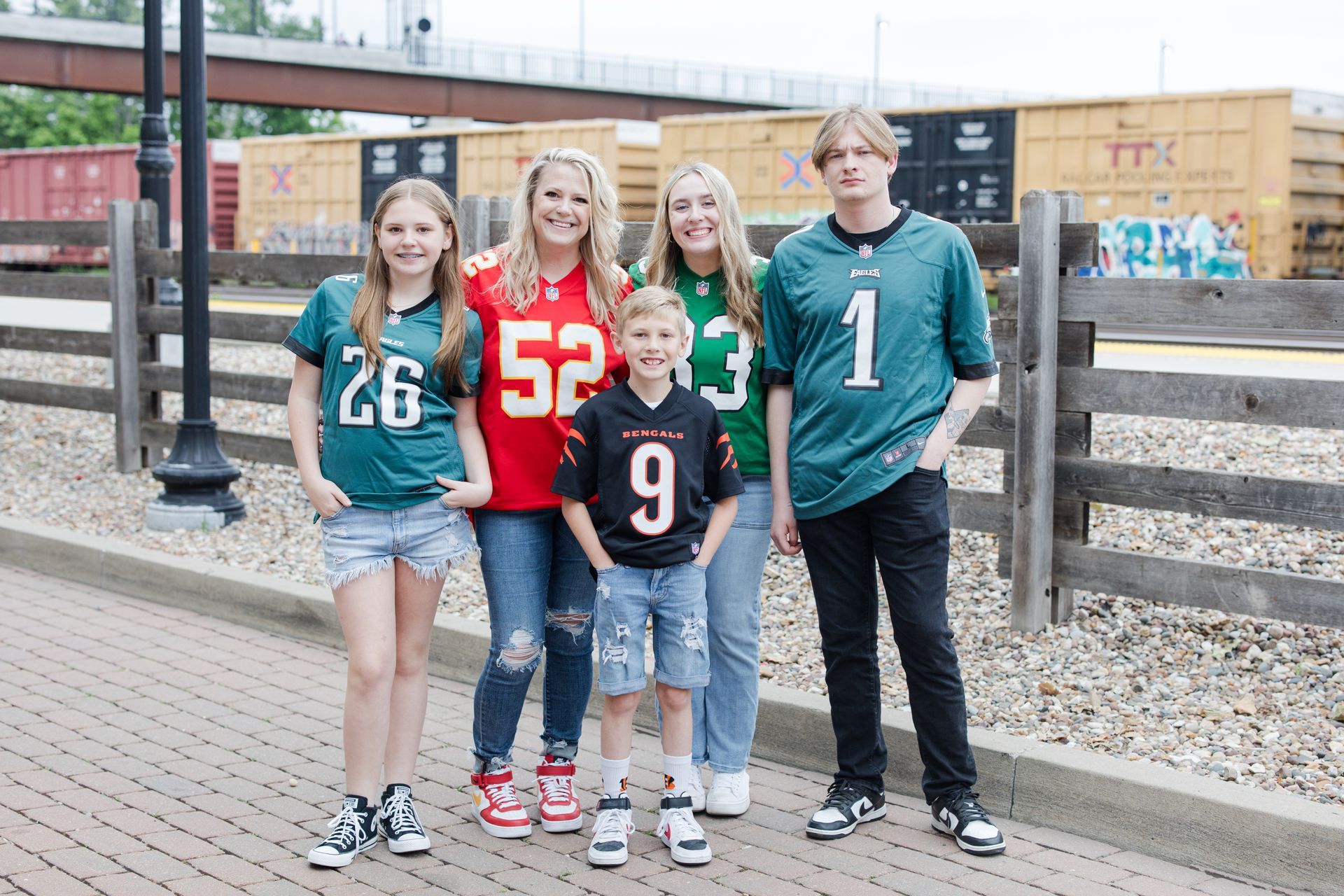 A photo of Kara Mcnabb, owner of Illuminate Designs and family