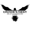 A black and white logo for crowe 's nest deli style sandwiches and more.