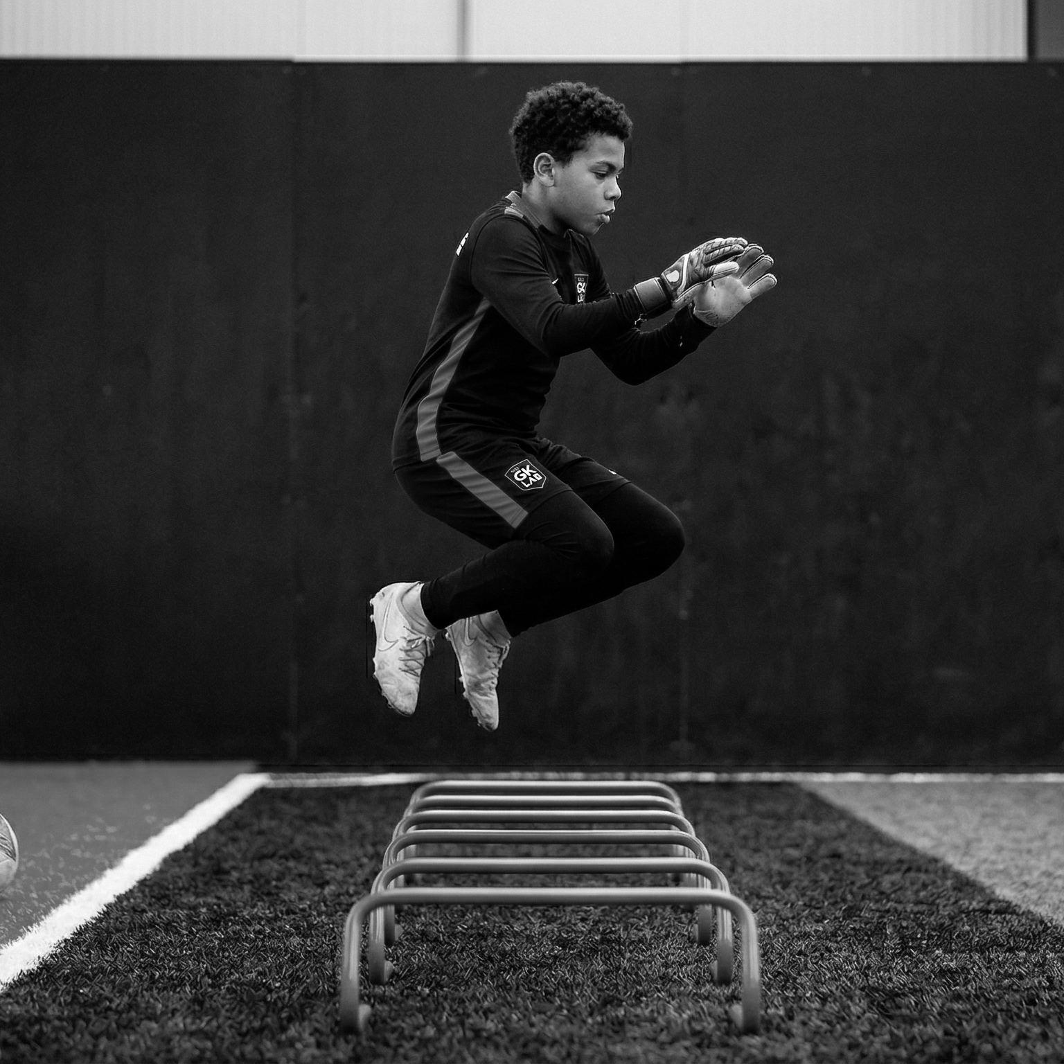 The Goalkeeper lab using staggered hurdles to train plyometrics for speed and agility