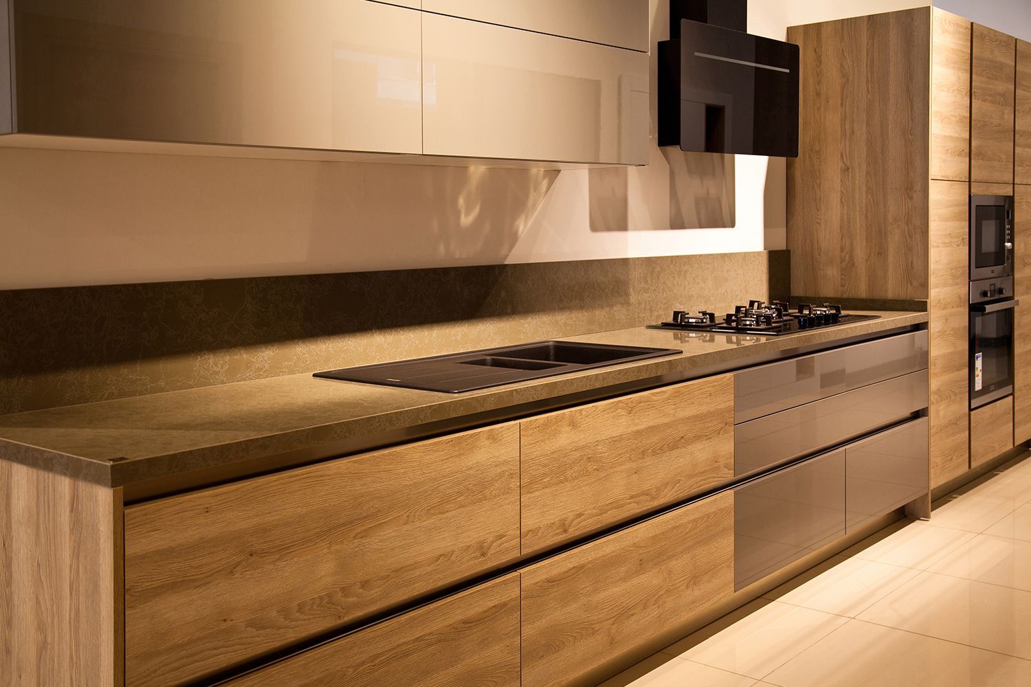 Modern kitchen with wood grain cabinets, stainless steel appliances, and beige countertops. Modern kitchen with wood grain cabinets, stainless steel appliances, and beige countertops.
