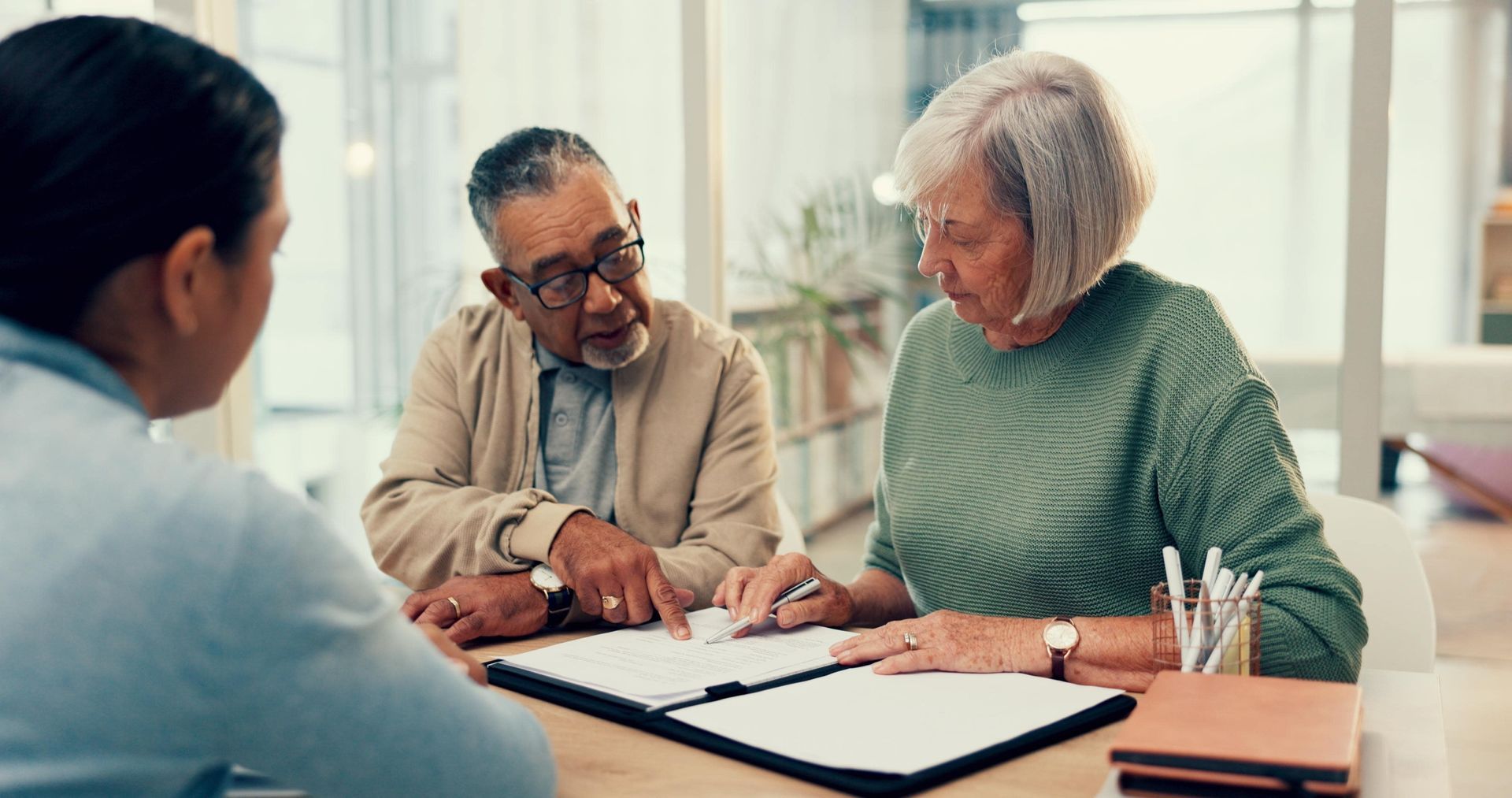 couple signing a document