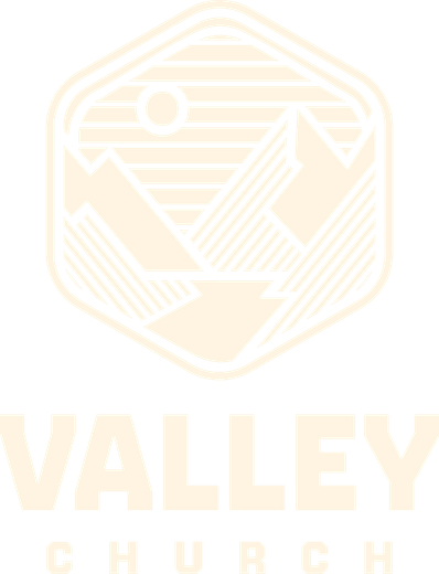 Valley Church logo in pale gold on a white background