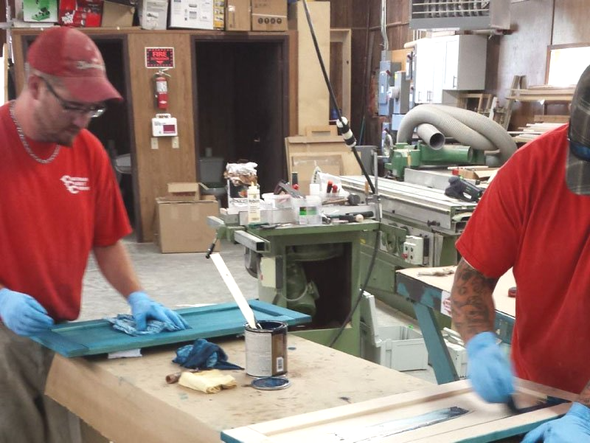 Team at Carolinian Cabinet Company making cabinets