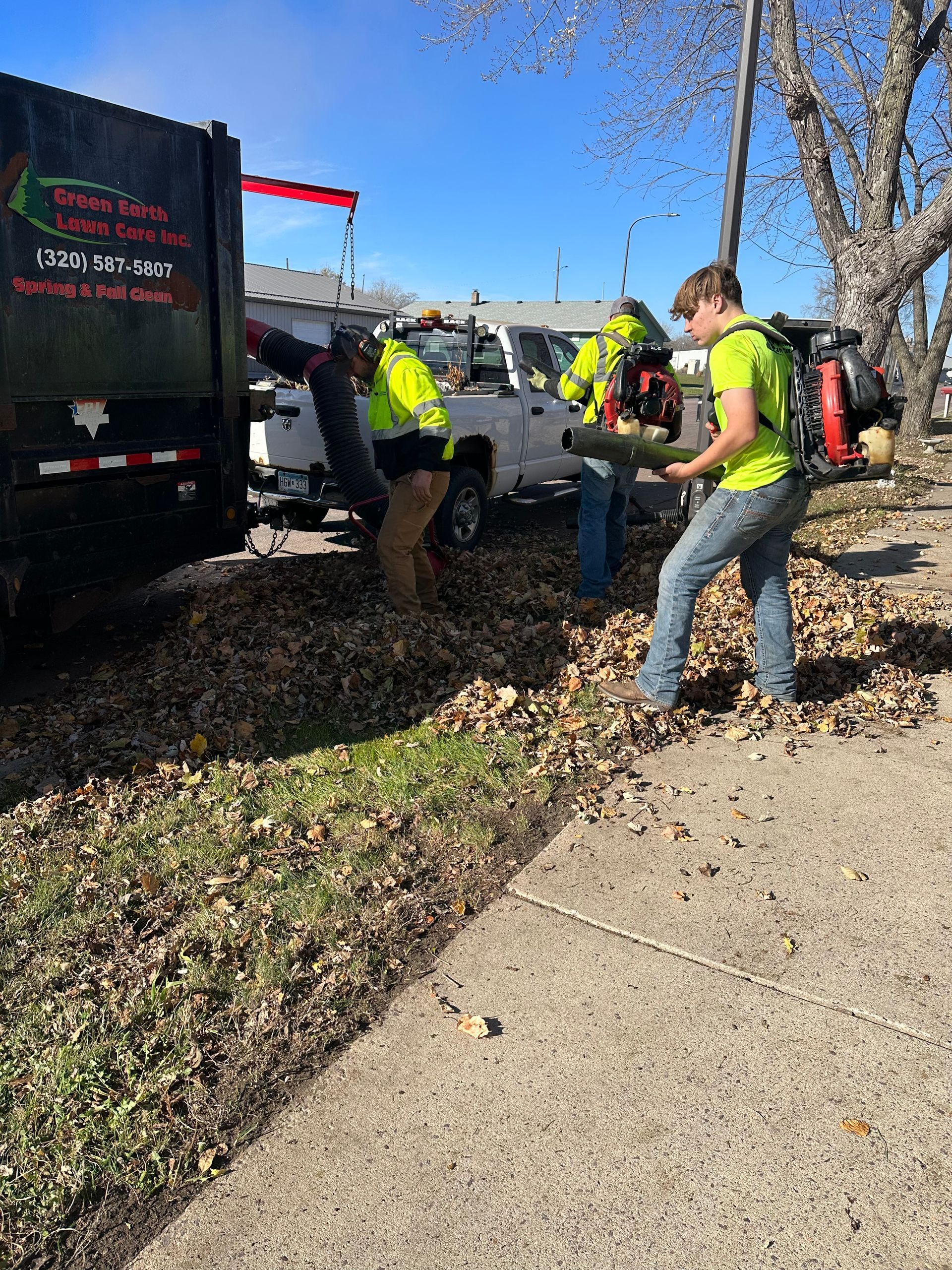Man Using Grass Cutter — Hutchinson, MN — Green Earth Lawn Care