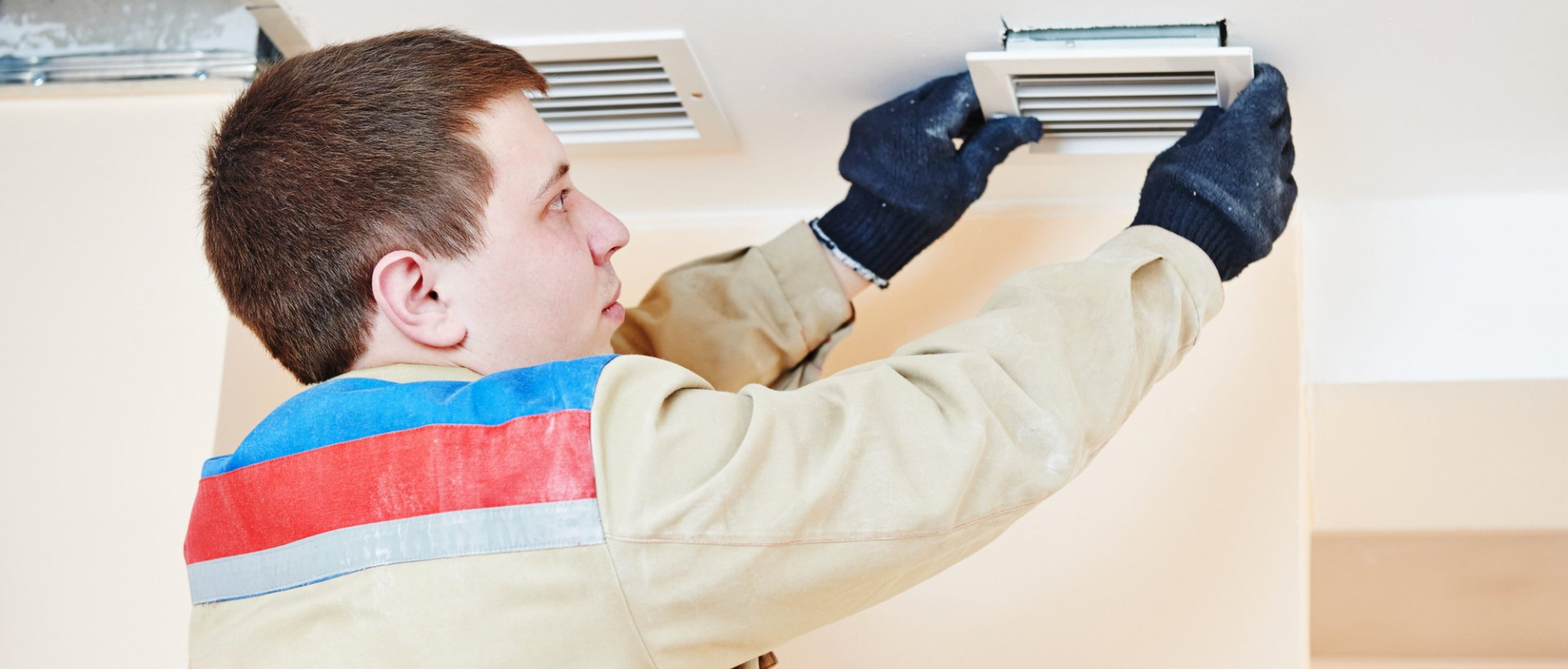 a man removing the dirty air filter
