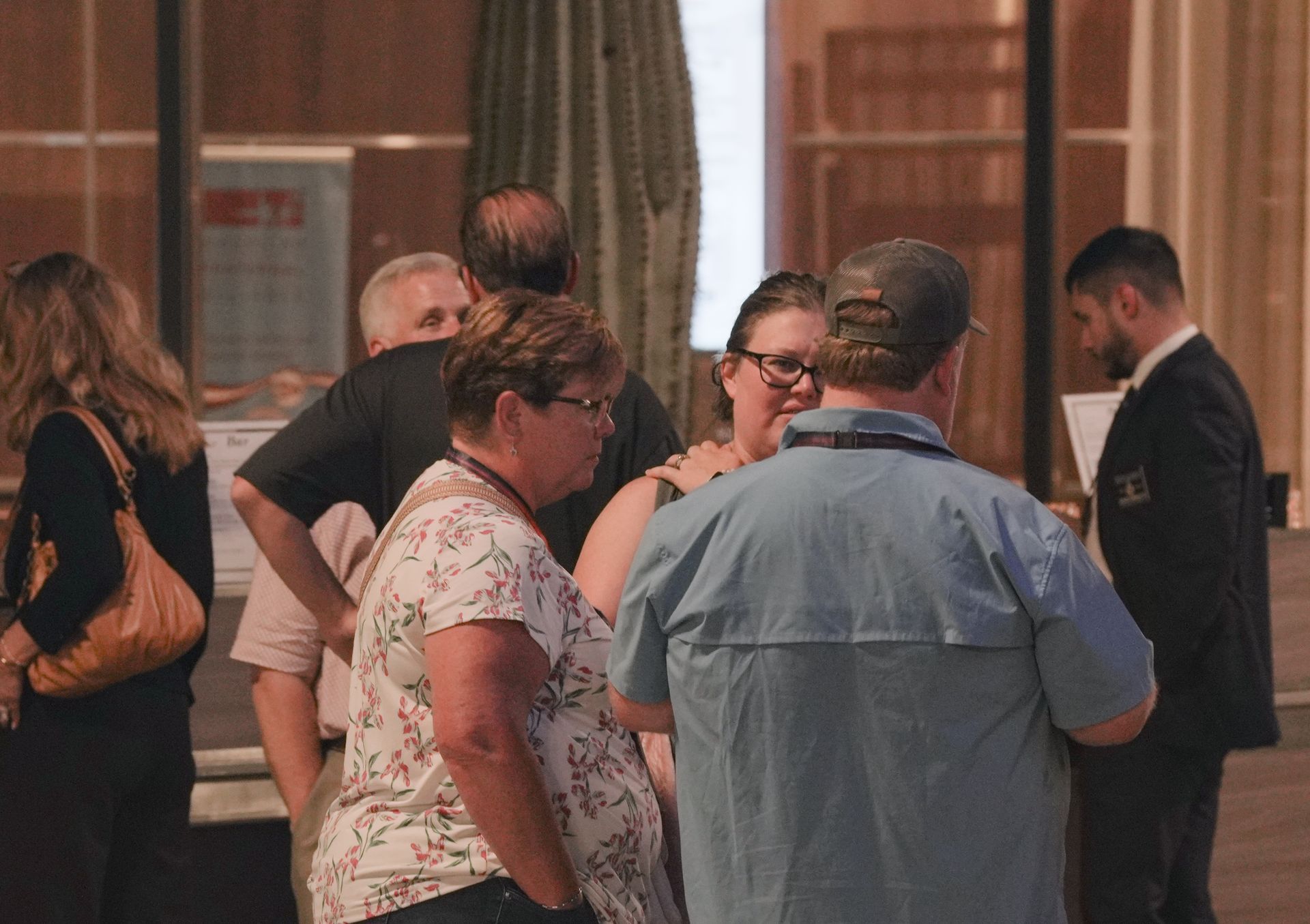 Conference attendees enjoying a small-group conversation