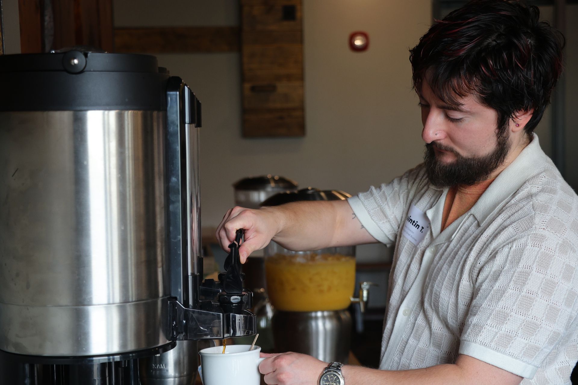 A participant at the 2026 Keys to the Kingdom event pours themself coffee at the Sunday Brunch send-off to close out the weekend. 