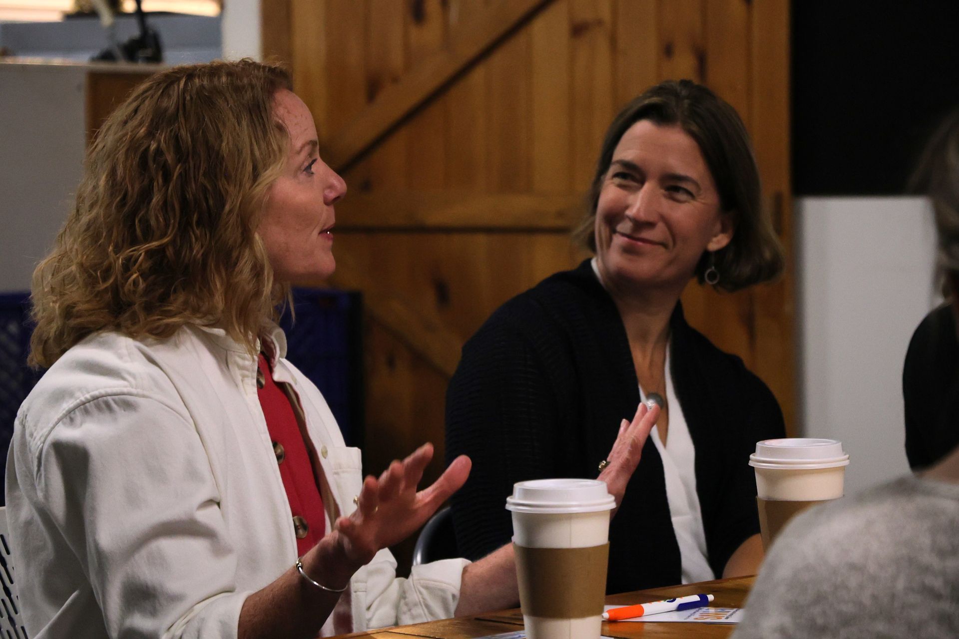 Business leaders and community members come together to learn about Joshua House Warming Shelter, the sponsors of September's Coffee & Connections in Newport, Vermont.