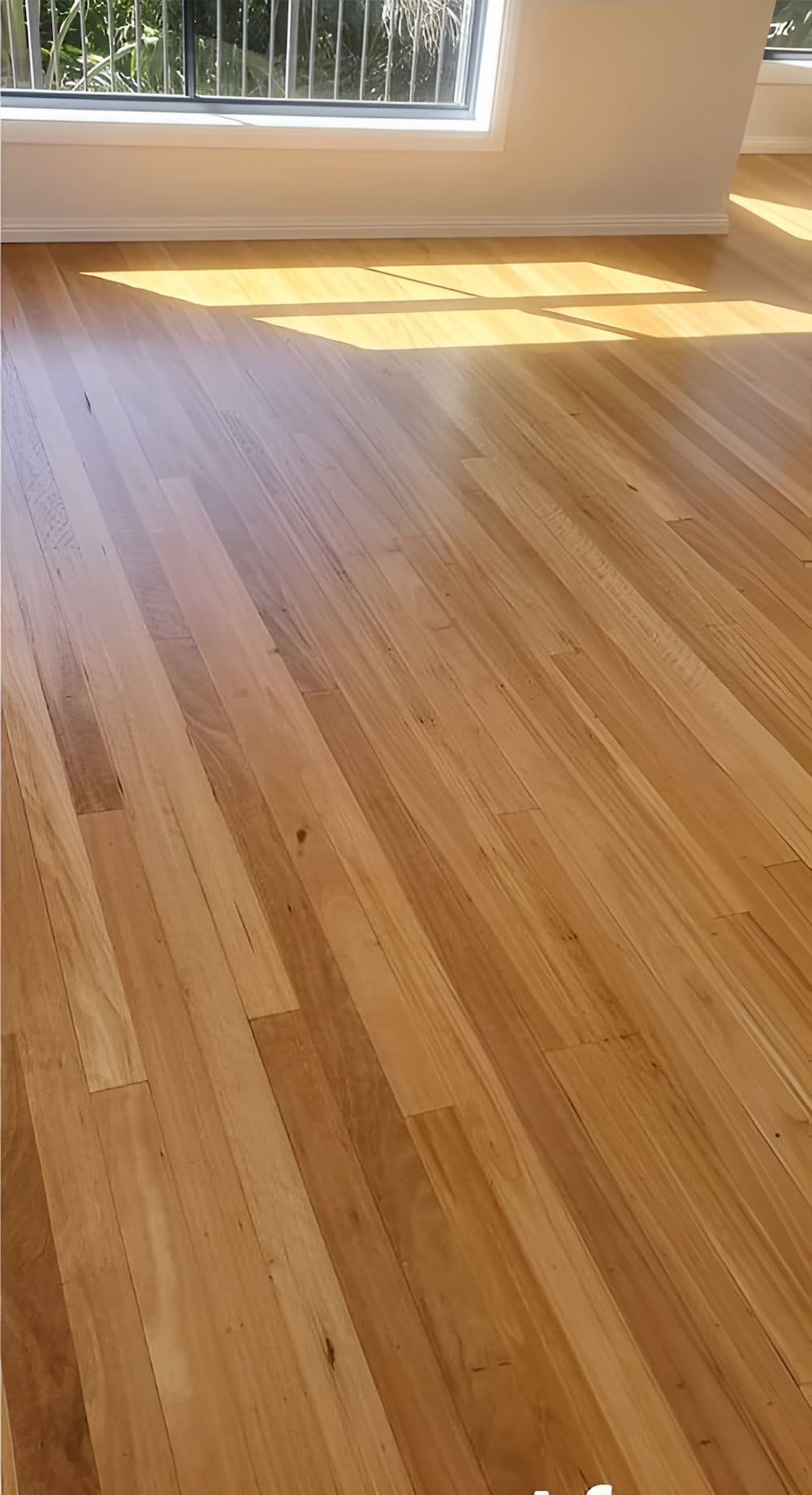 A Room With A Wooden Floor And A Window — Kyall Chalker Floor Sanding & Polishing In North Haven, NSW
