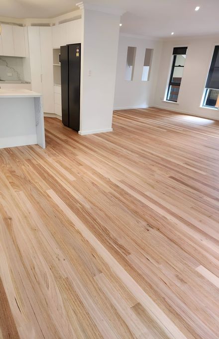 There is a Wooden Floor in the Middle of the Room — Kyall Chalker Floor Sanding & Polishing In North Haven, NSW