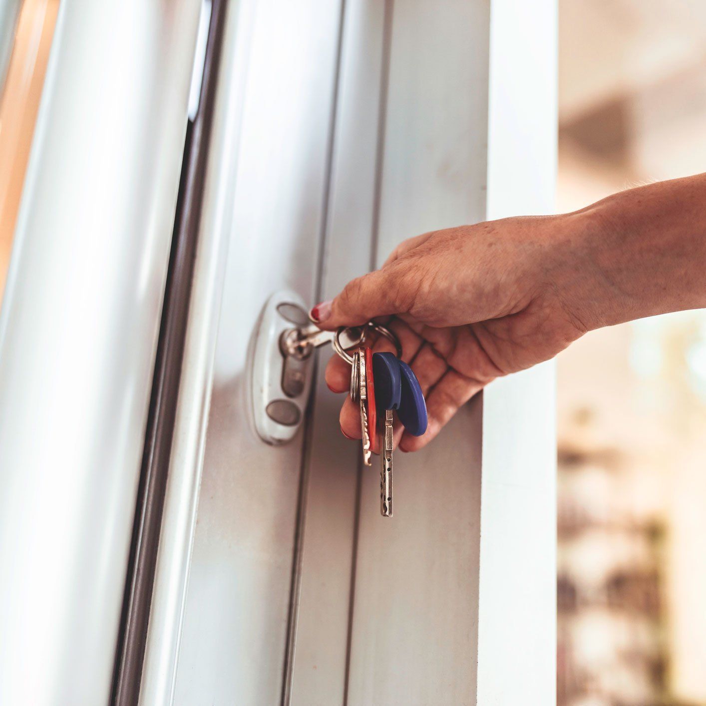 Woman's hand opening a door