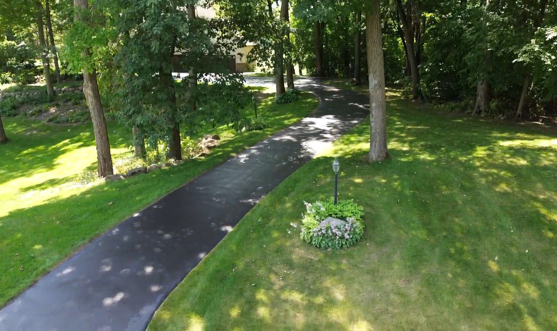 Drone image of a sealcoated driveway