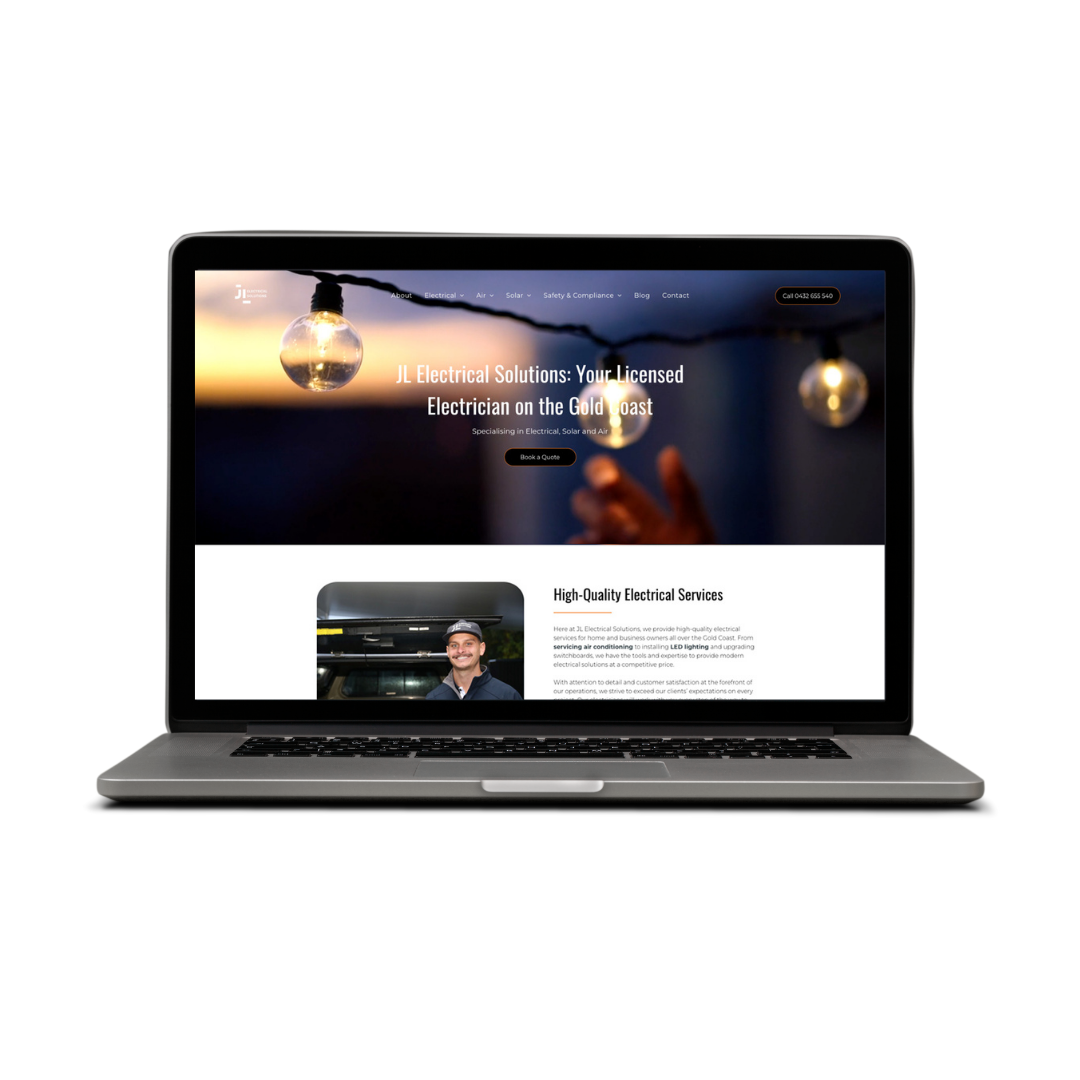 Laptop displaying a electrical website with a dark header, a photo of a person, and text.