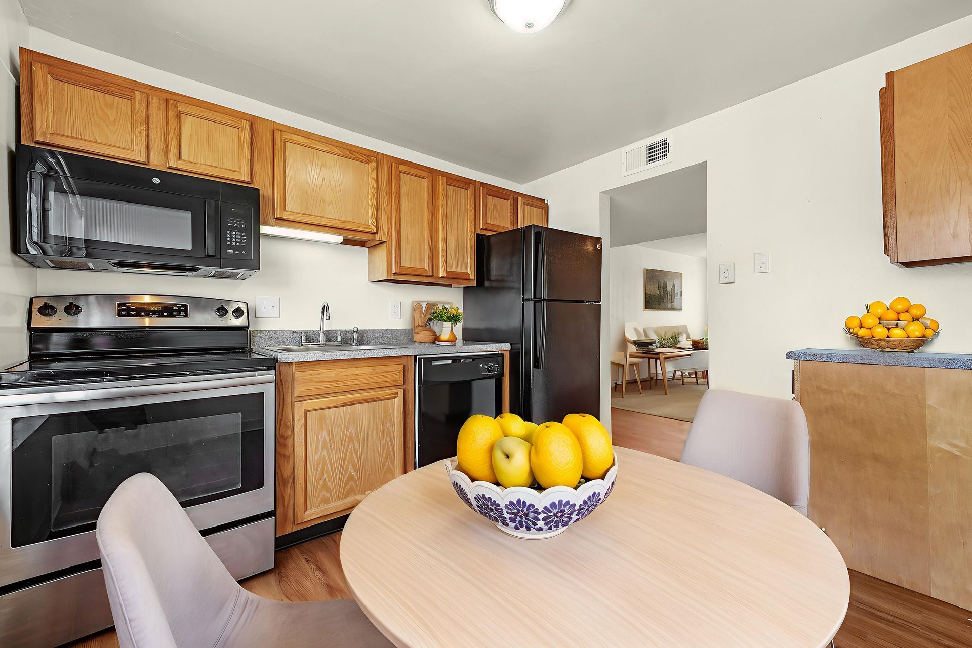 Kitchen with black fridge