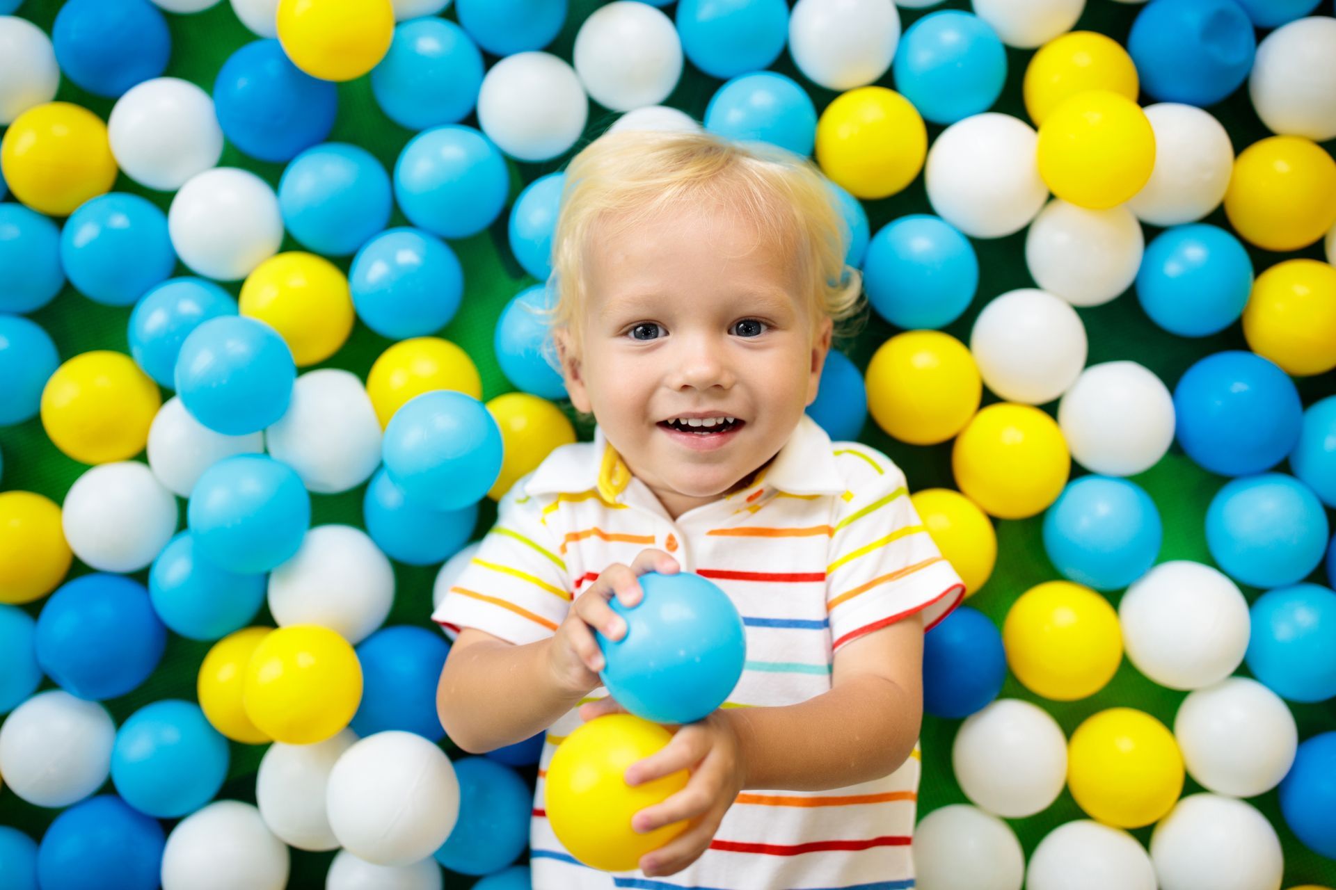Kid Playing with Balls