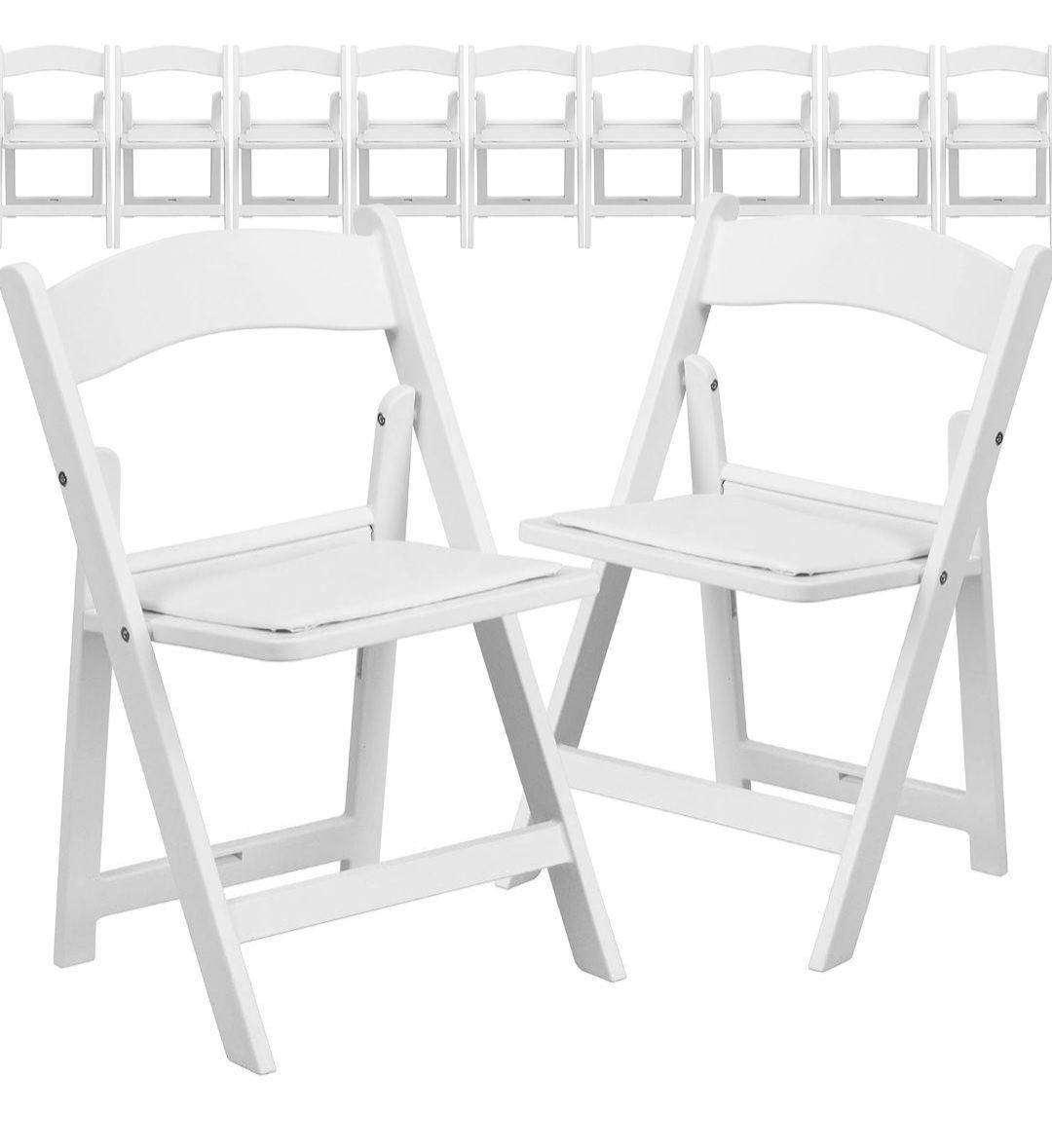 A long table and chairs are set up for a party.