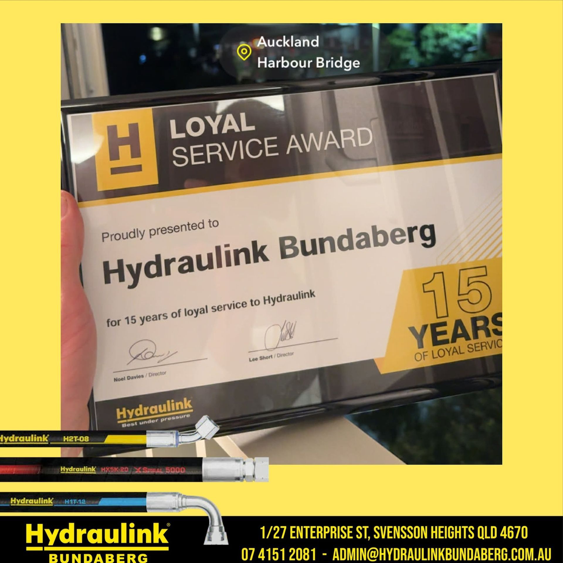 Hydraulink Bundaberg 15-year loyalty service award plaque at Auckland Harbour Bridge site